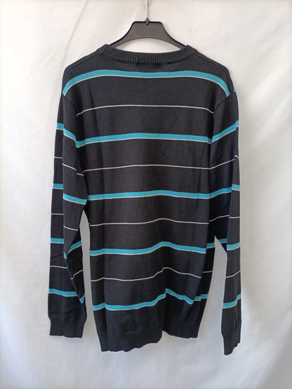 POLO RALPH LAUREN. Black striped sweater.