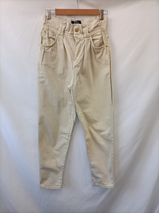 BERSHKA. Pantalón slouchy beige T.36