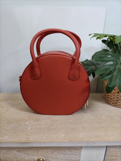 JO&MR JOE. Bolso naranja redondo