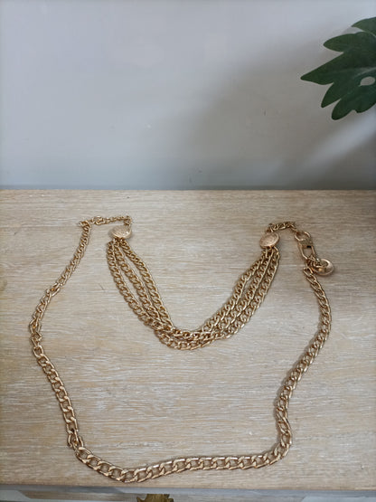 OTRAS. Cinturon dorado