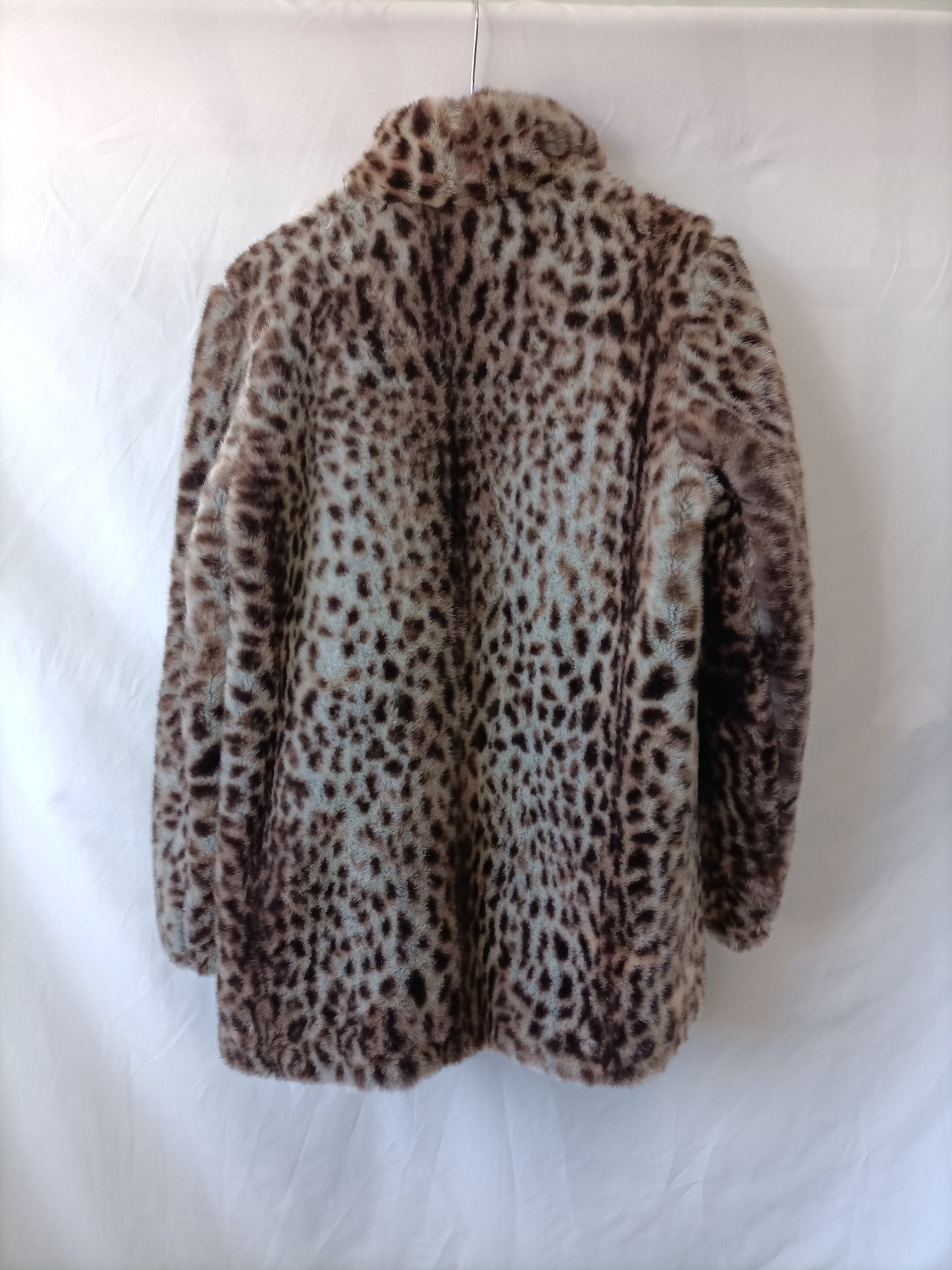 ZARA. Abrigo animal print T.s