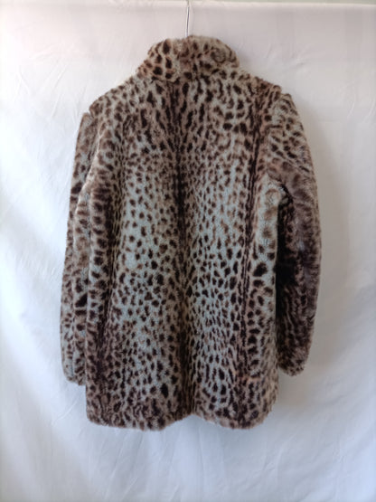 ZARA. Abrigo animal print T.s