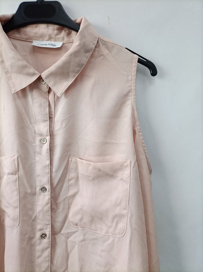 CALVIN KLEIN. Pink off-the-shoulder blouse Tu(m)