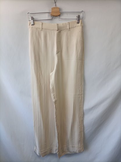 ZARA. Pantalón fluido beige T.m