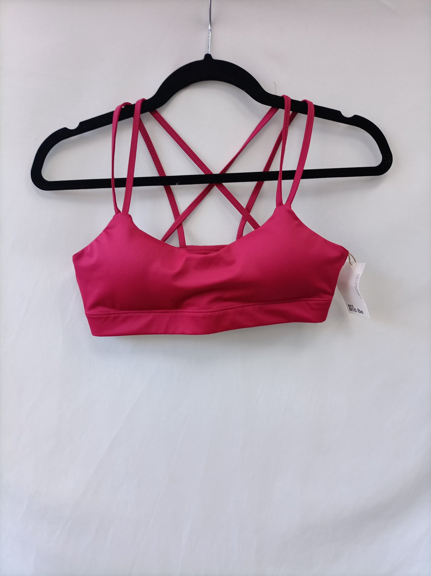 ACTANDBE. Top Deportivo rosa T.s