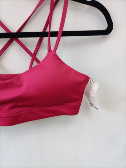 ACTANDBE. Top Deportivo rosa T.s