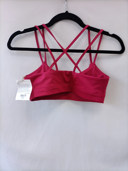 ACTANDBE. Top Deportivo rosa T.s