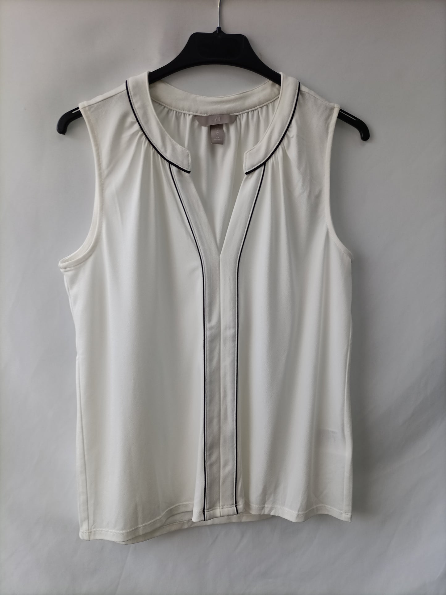 H&M. Blusa blanca fluida T.s