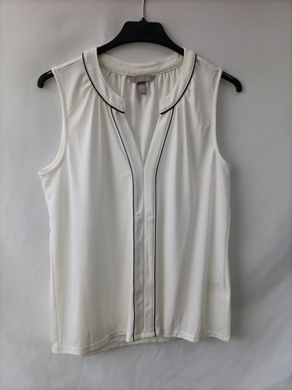 H&M. Blusa blanca fluida T.s