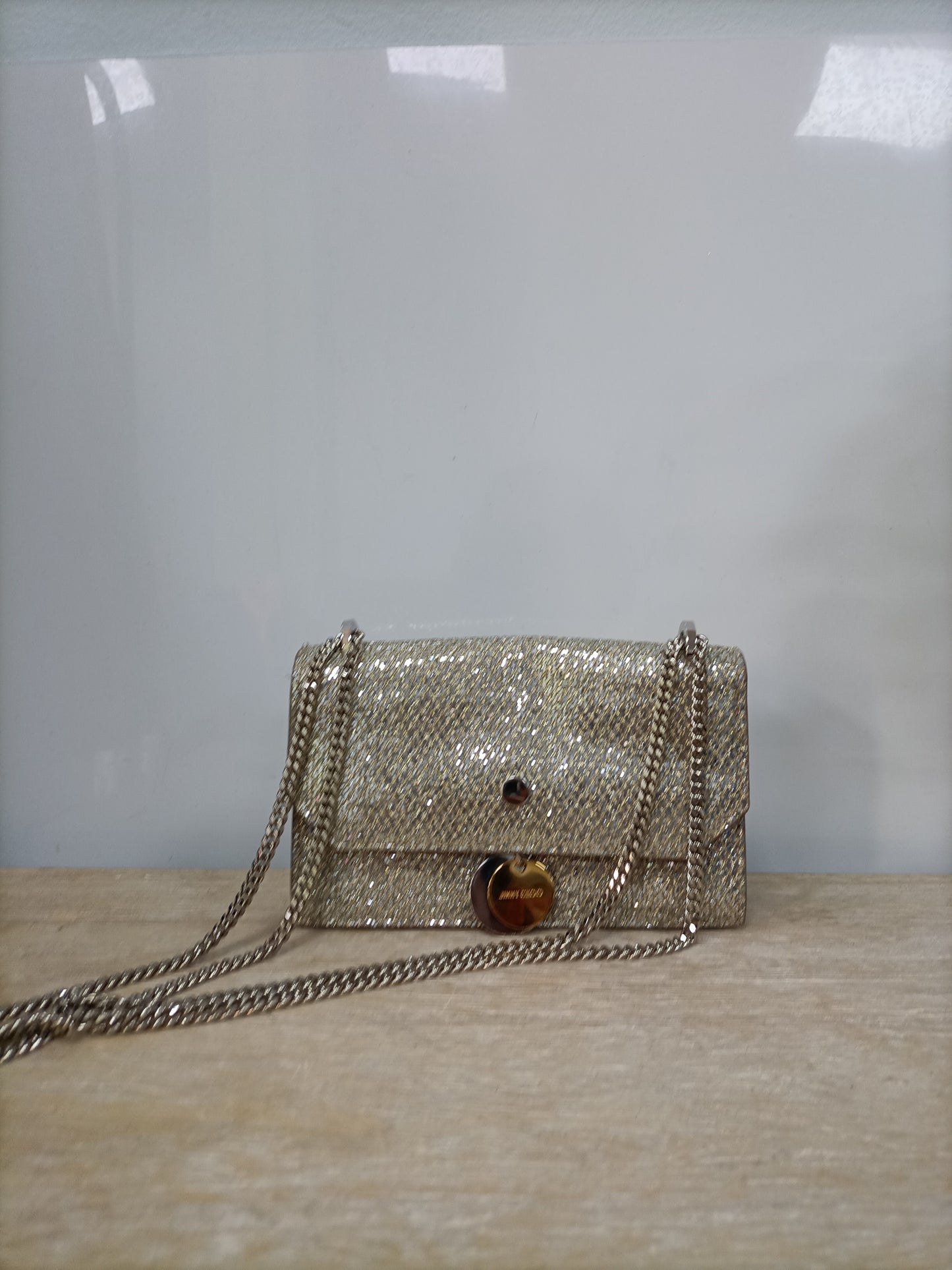 JIMMY CHOO. Bolso mini plateados