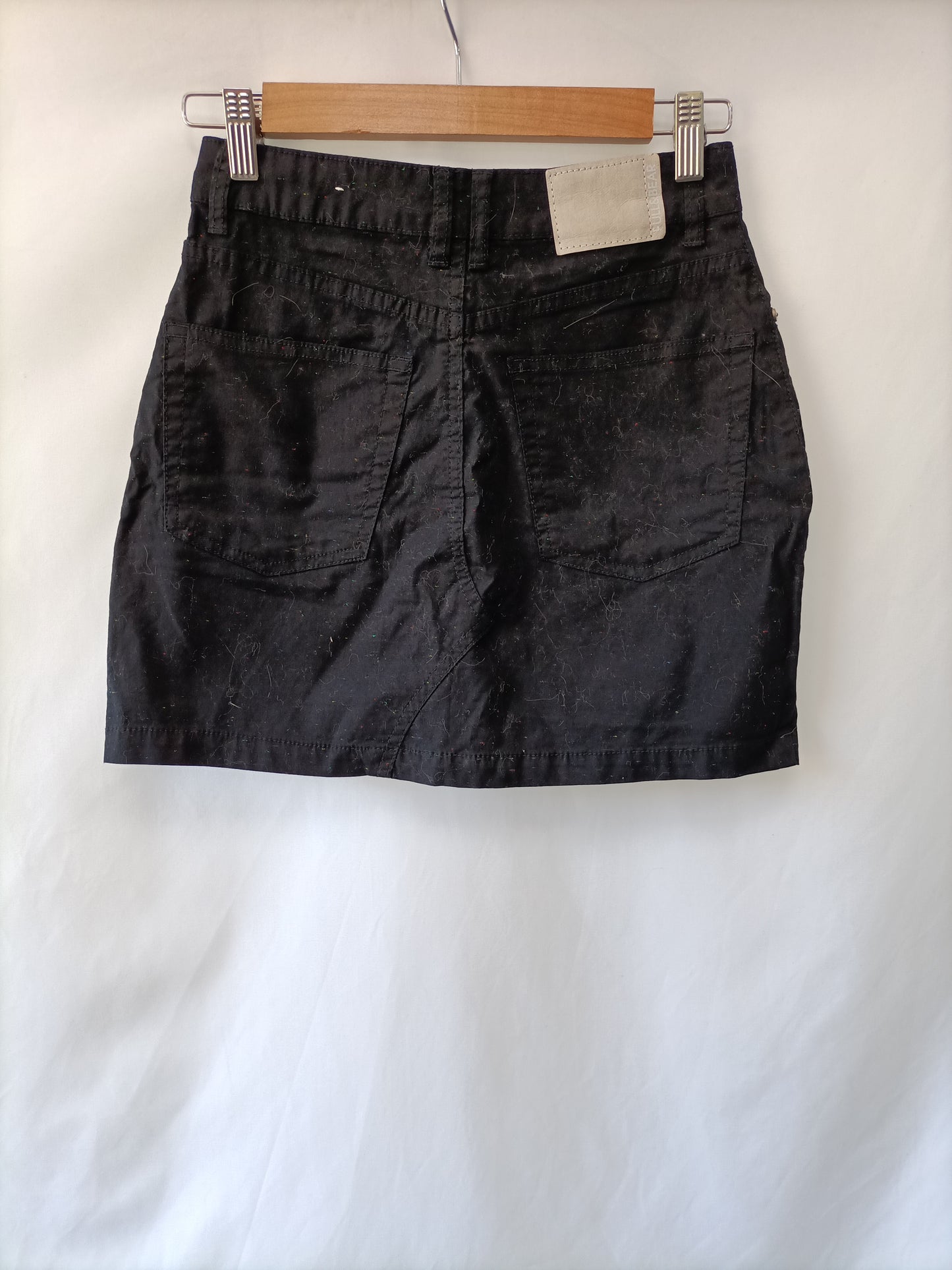 PULL&amp;BEAR. Black Ts thread skirt
