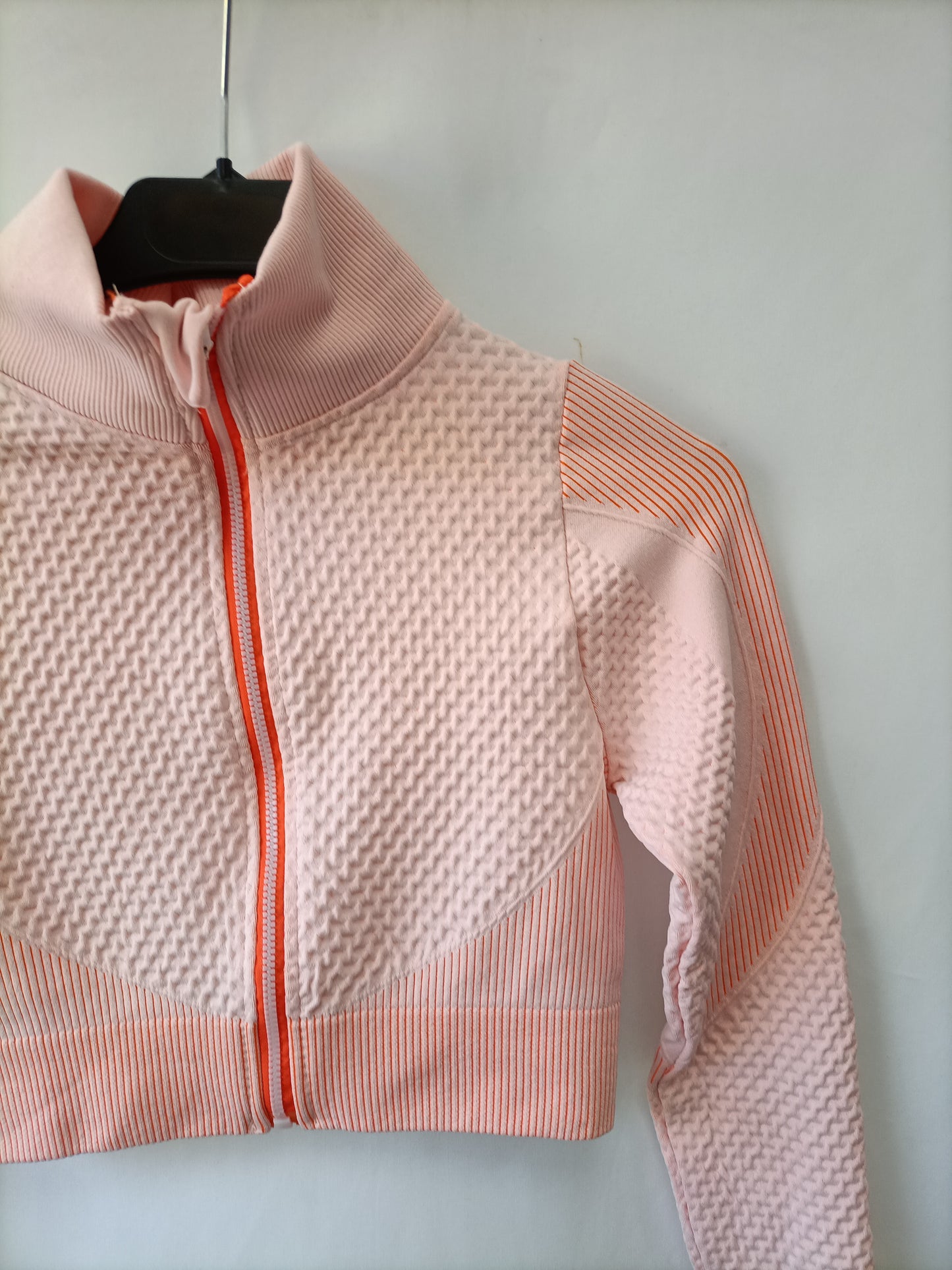 OTHERS. Orange textured top Your(s)