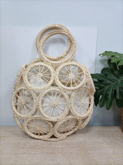 OTRAS. Bolso de mano rafia