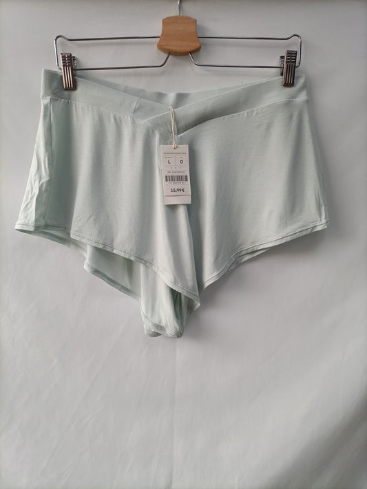 OYSHO. Pantalón verde elástico T.l