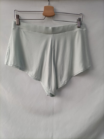 OYSHO. Pantalón verde elástico T.l