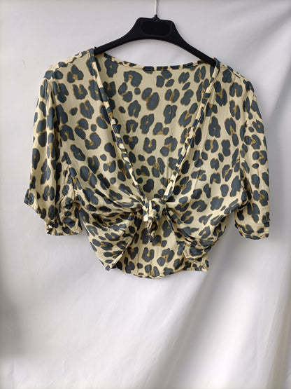 OTRAS. Total look animal print Tu(l)