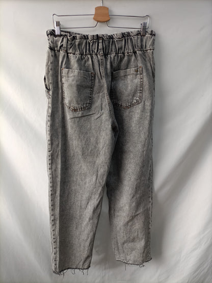 ZARA. Pantalón slouchy gris T.40