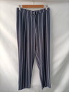 H&M. Pantalón azul rayas T.38