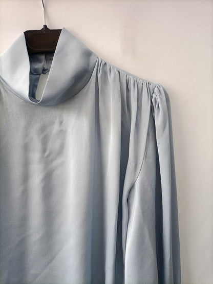 YOU LOOK AWESOME.Sky blue satin blouse Ts
