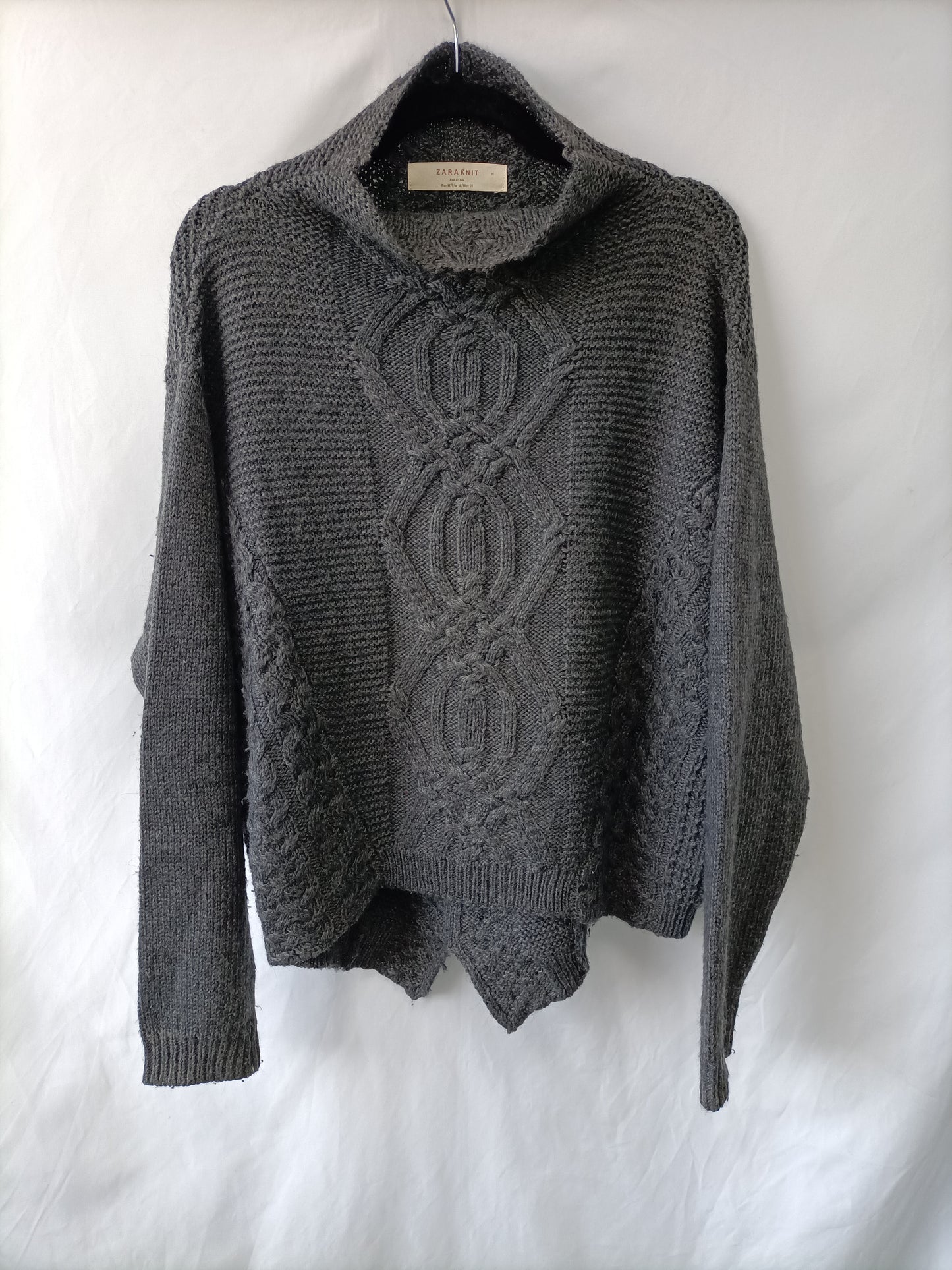 ZARA. Jersey gris ochos T.m