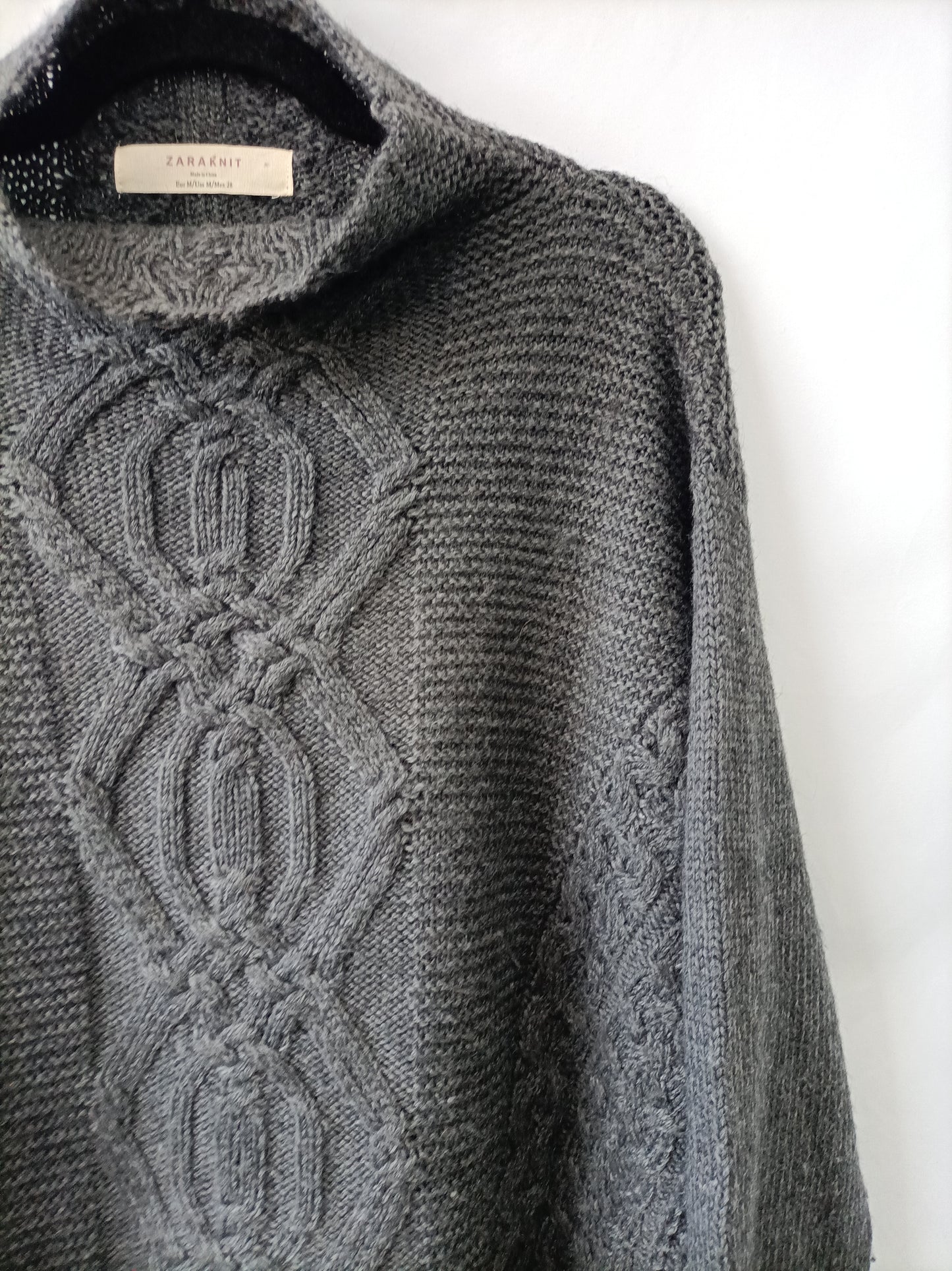 ZARA. Jersey gris ochos T.m