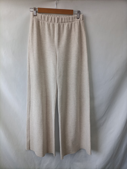 ZARA. Pantalón ancho beige T.m