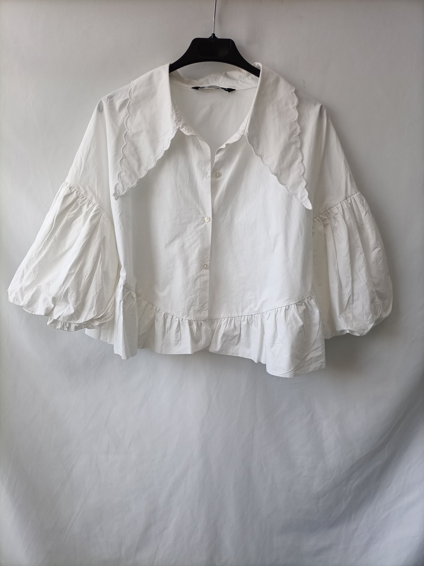 ZARA. White blouse with a T-shirt collar