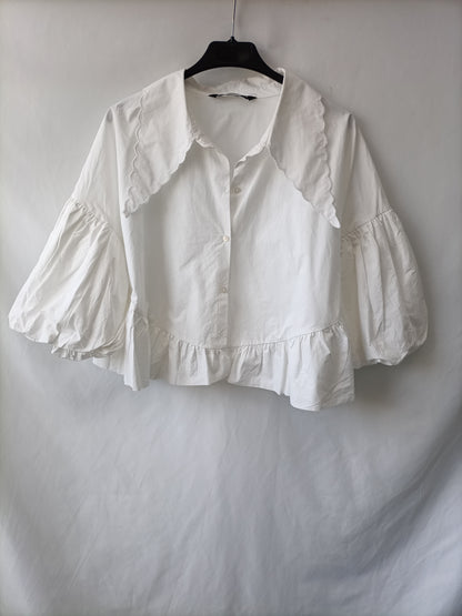 ZARA. White blouse with a T-shirt collar