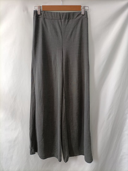 ZARA. Flowy grey trousers Tm