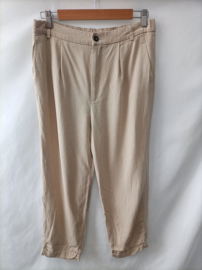 market. ZARA. Pantalón Fluido beige T.m