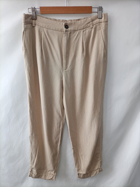 market. ZARA. Pantalón Fluido beige T.m