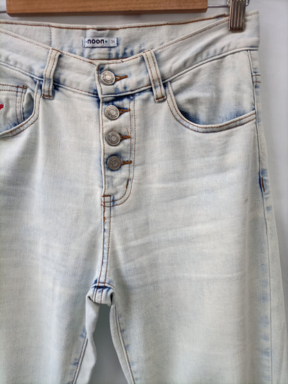 NOON. Distressed trousers size 34