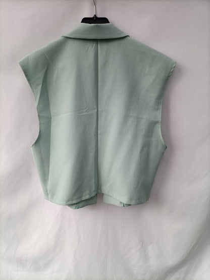OTHERS. Aqua green vest Your(s)