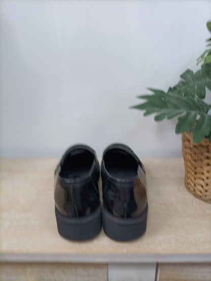 OTRAS. Mocasines negros T.38