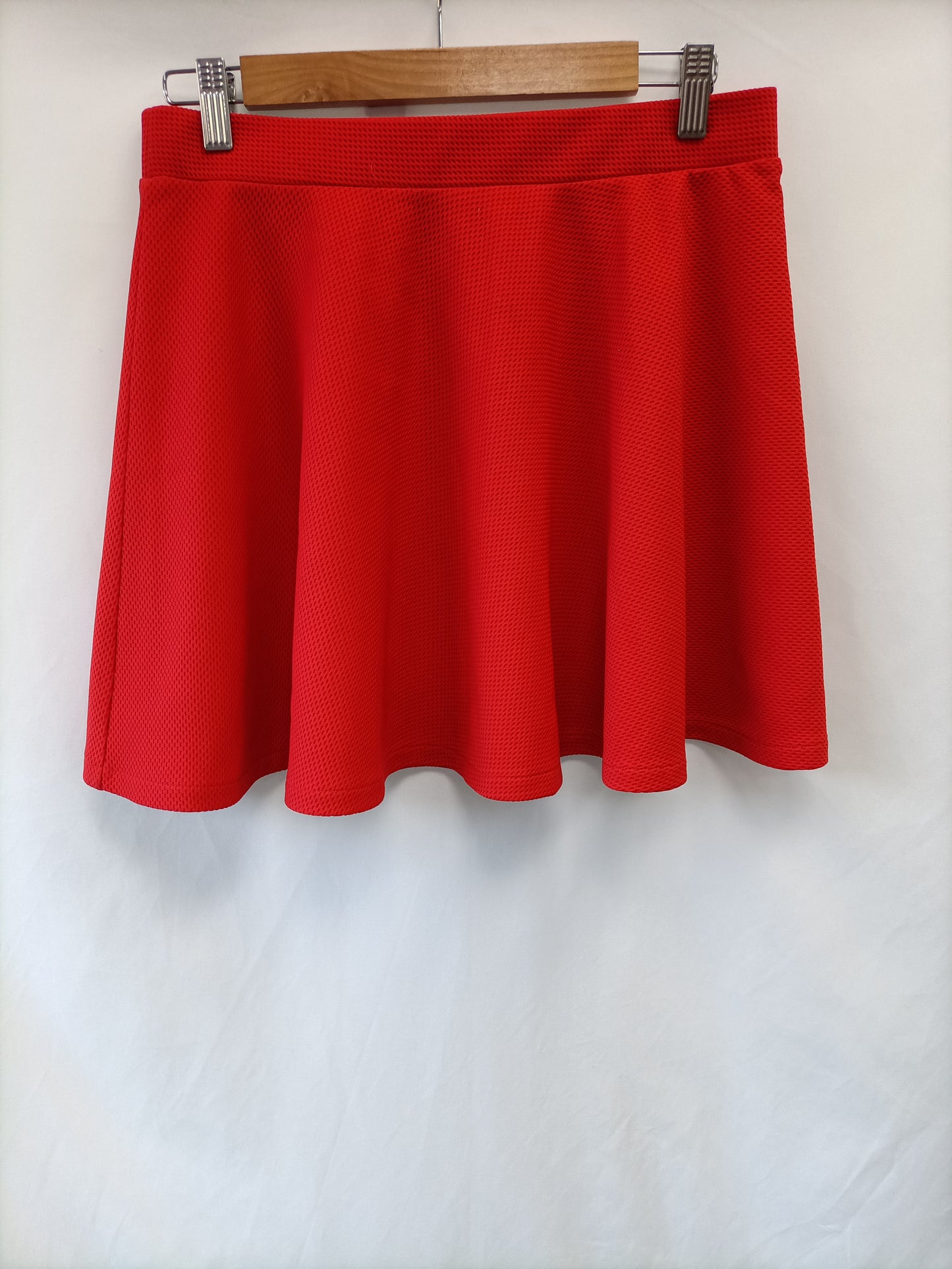 PRIMARK. Short red skirt size 40