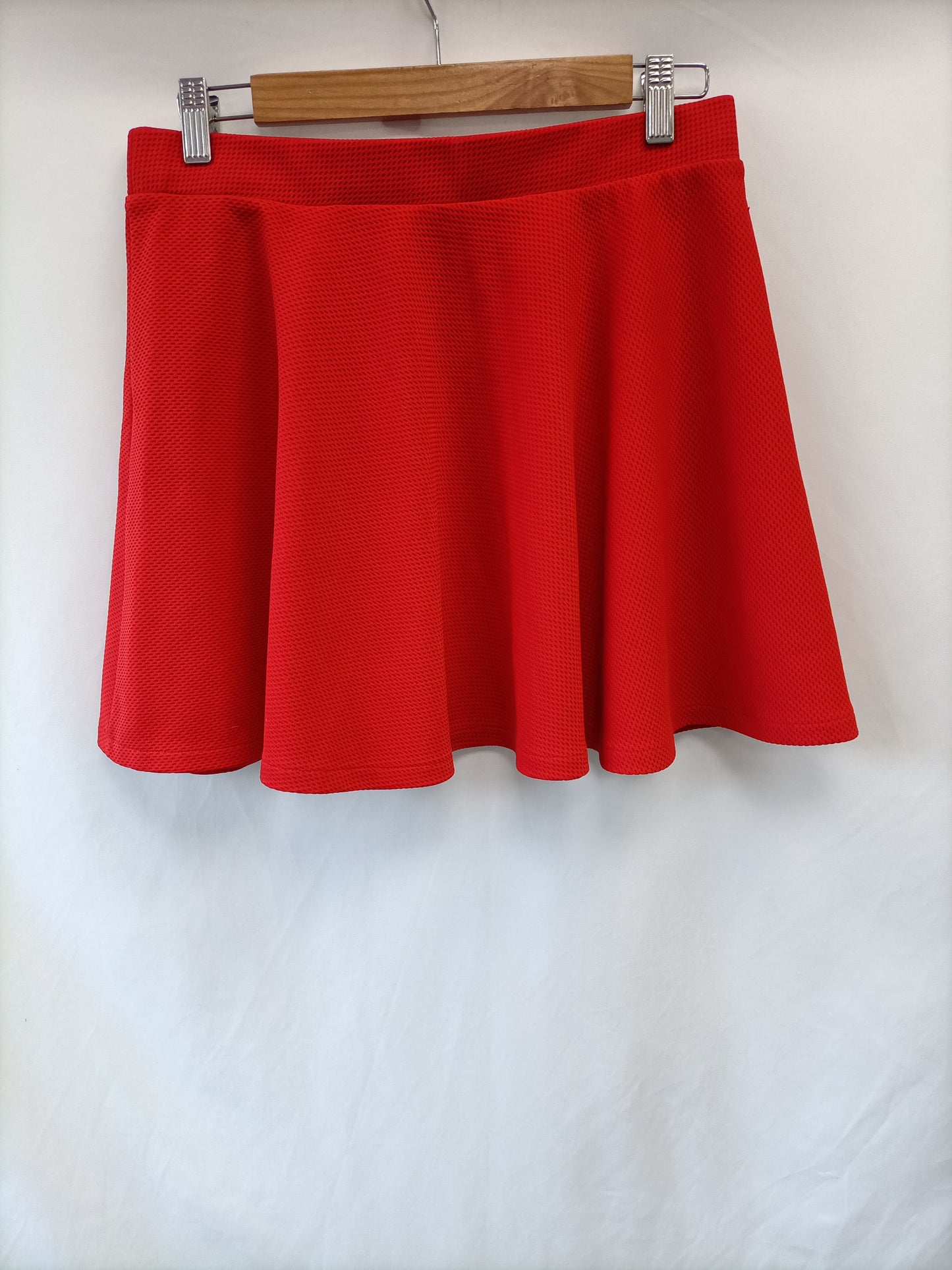 PRIMARK. Short red skirt size 40