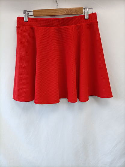 PRIMARK. Short red skirt size 40