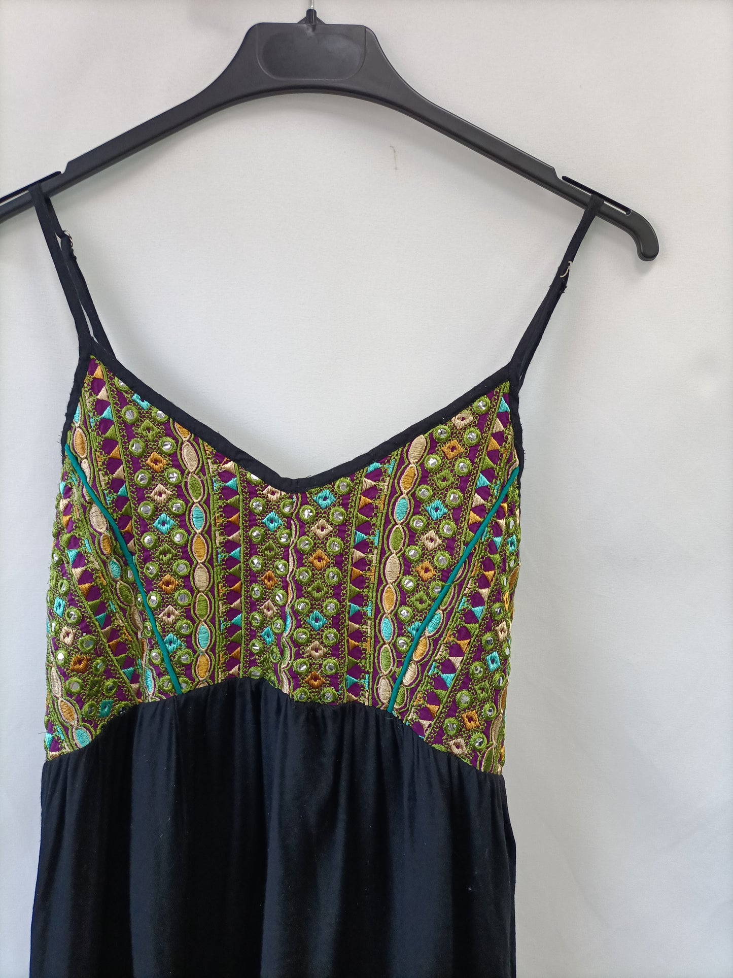 NATURA. Black dress with a TM neckline