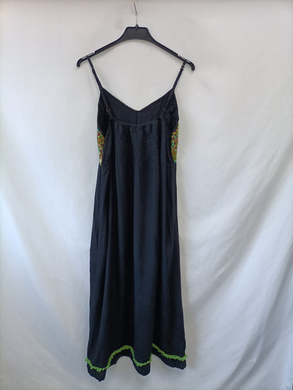 NATURA. Black dress with a TM neckline