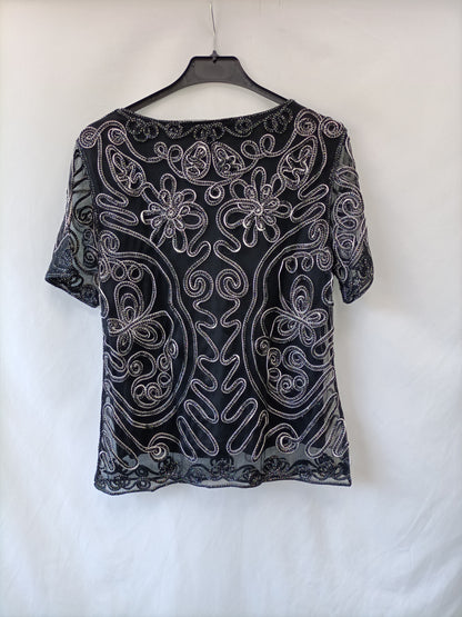 OTRAS. Camiseta bordados T.44