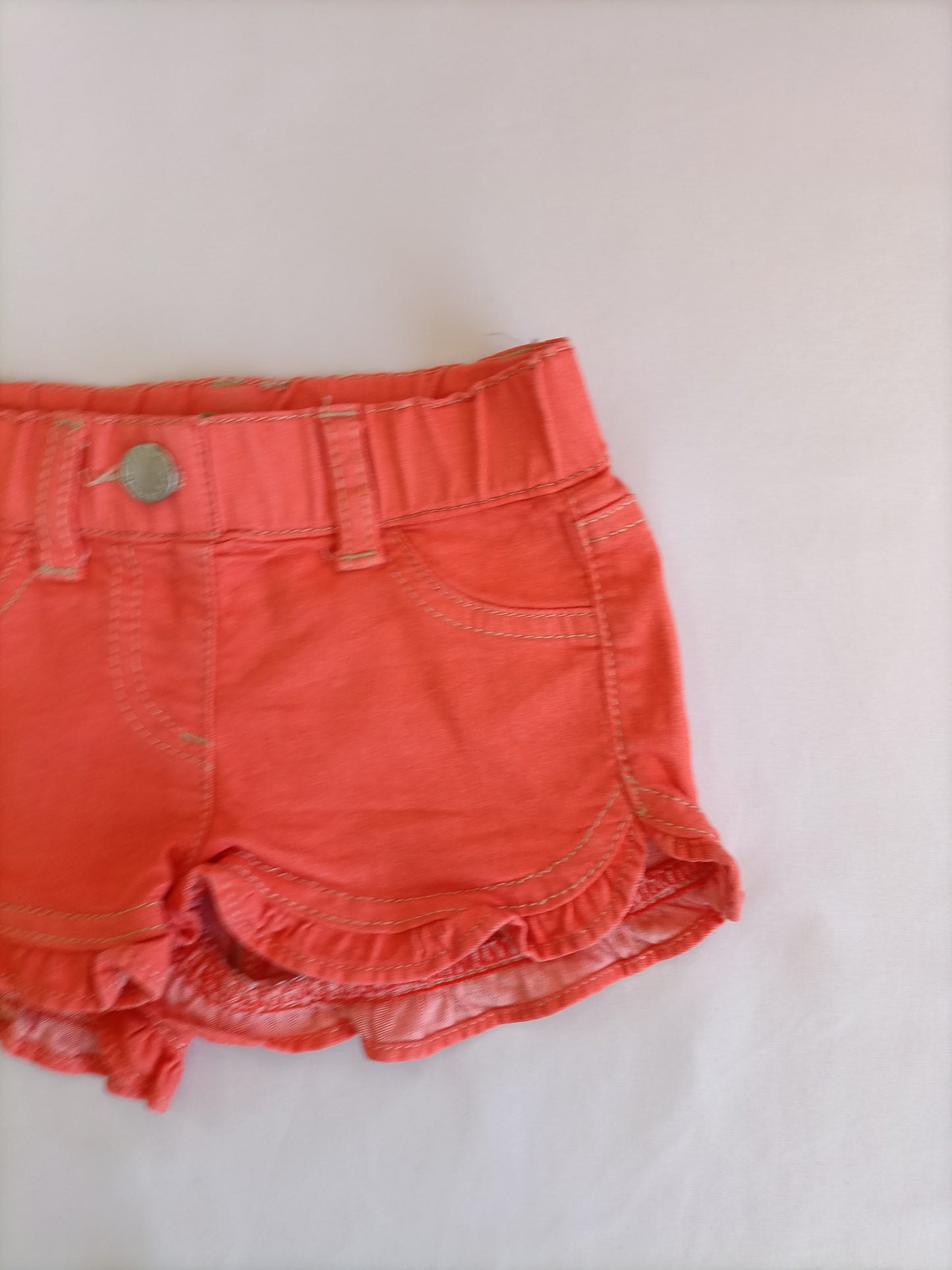 BENETTON. Orange shorts, size 1 year
