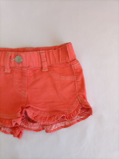 BENETTON. Orange shorts, size 1 year