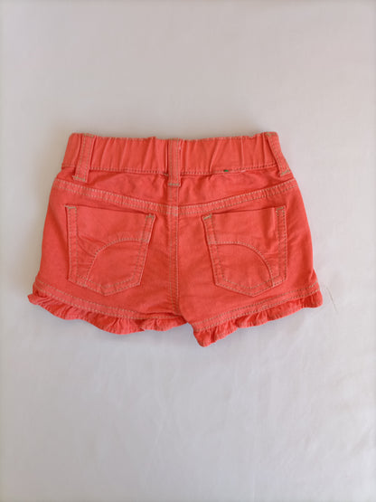 BENETTON. Orange shorts, size 1 year