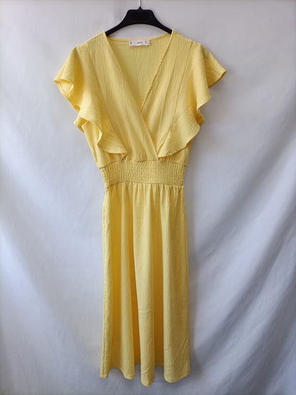 MANGO. Vestido midi amarillo T.xs