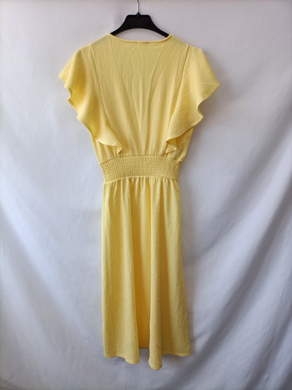 MANGO. Vestido midi amarillo T.xs