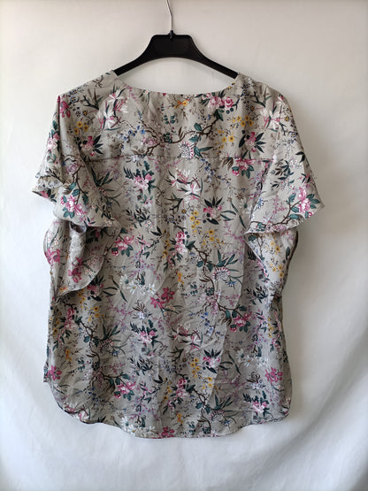 H&M. Blusa flores T.44