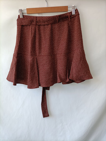 STRADIVARIUS.Falda pantalón lunares T.M