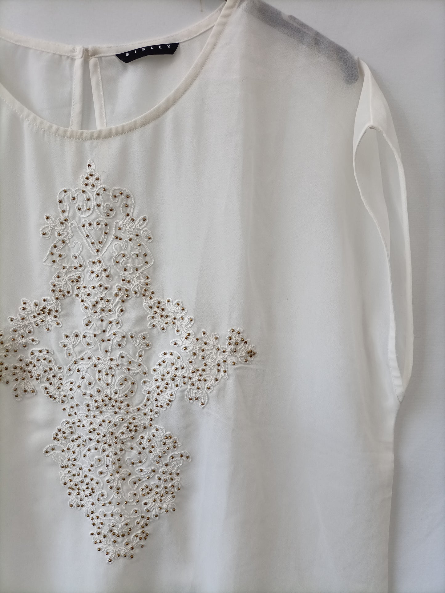 SISLEY. Blusa blanca sin mangas pelotas doradas T.l