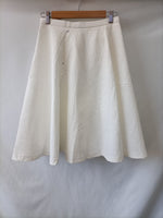 ZARA. Falda midi blanca textura volante T.s