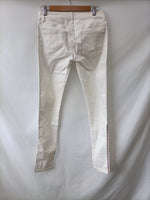 KOOKAï. Pantalones pitillo blancos bordados lados T.36